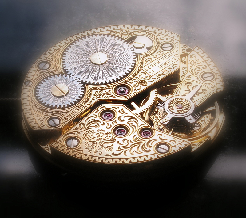 Gold engraved mechanical watch movement with ruby jewels