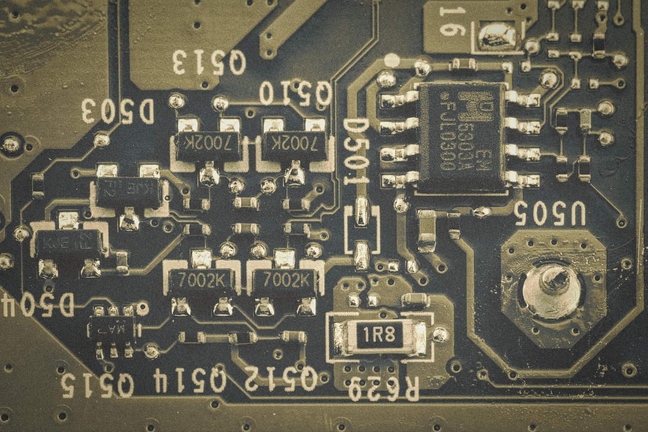 Printed circuit board with gold traces and surface-mount components